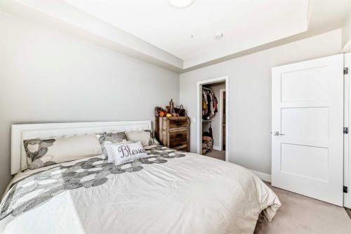 210-8355 19 Avenue Sw, Calgary, AB - Indoor Photo Showing Bedroom