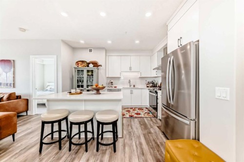 210-8355 19 Avenue Sw, Calgary, AB - Indoor Photo Showing Kitchen With Upgraded Kitchen