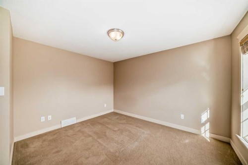 42 Ypres Green Sw, Calgary, AB - Indoor Photo Showing Other Room