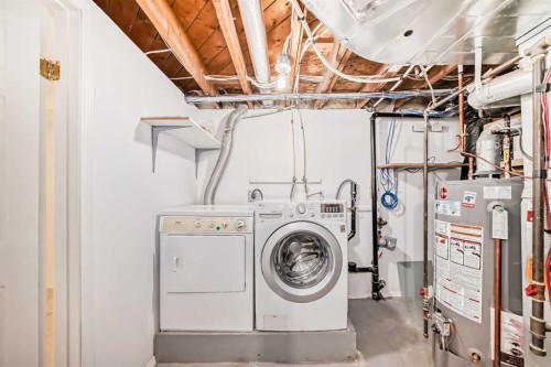 42 Ypres Green Sw, Calgary, AB - Indoor Photo Showing Laundry Room