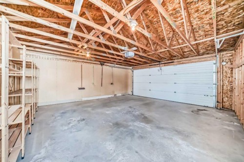 42 Ypres Green Sw, Calgary, AB - Indoor Photo Showing Garage