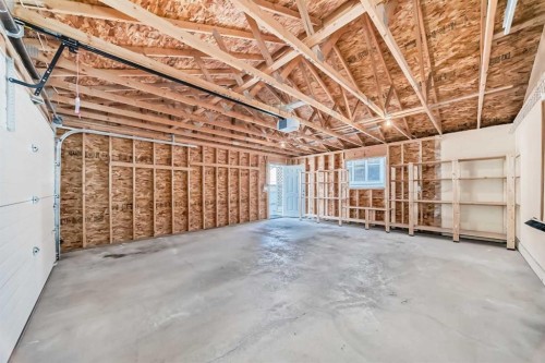 42 Ypres Green Sw, Calgary, AB - Indoor Photo Showing Garage