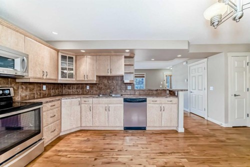 42 Ypres Green Sw, Calgary, AB - Indoor Photo Showing Kitchen With Stainless Steel Kitchen