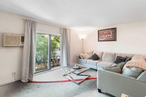 3212 Dover Crescent Se, Calgary, AB - Indoor Photo Showing Living Room