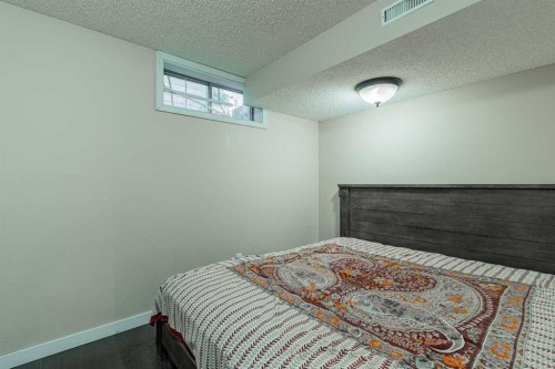 143 Castlegrove Road Ne, Calgary, AB - Indoor Photo Showing Bedroom