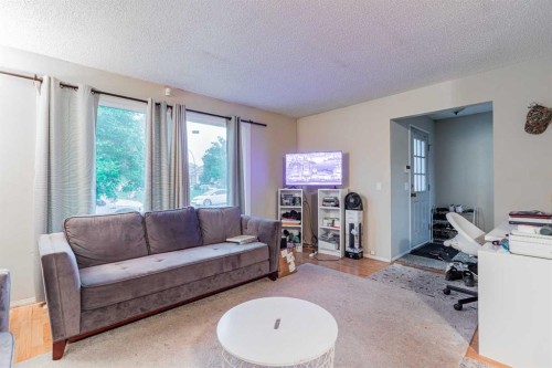143 Castlegrove Road Ne, Calgary, AB - Indoor Photo Showing Living Room