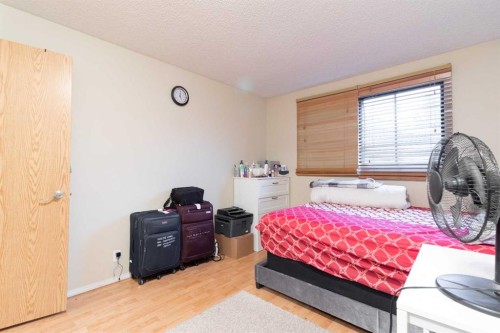 143 Castlegrove Road Ne, Calgary, AB - Indoor Photo Showing Bedroom