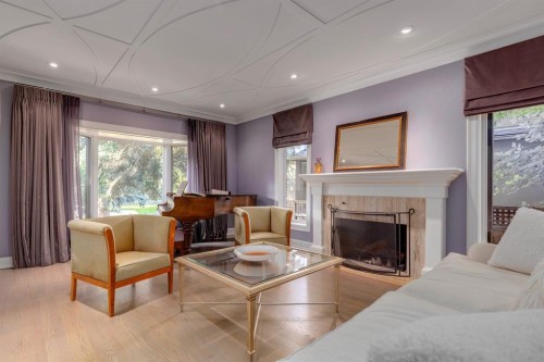 1212 Montreal Avenue Sw, Calgary, AB - Indoor Photo Showing Living Room With Fireplace