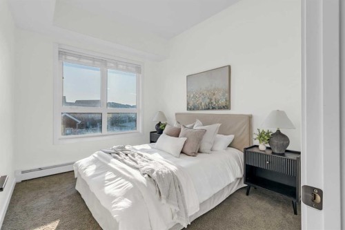 1402-350 Livingston Common Ne, Calgary, AB - Indoor Photo Showing Bedroom