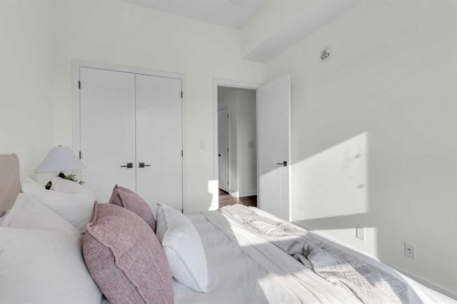 1402-350 Livingston Common Ne, Calgary, AB - Indoor Photo Showing Bedroom