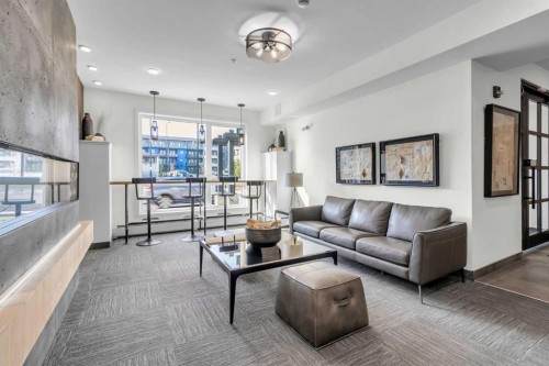 1402-350 Livingston Common Ne, Calgary, AB - Indoor Photo Showing Living Room
