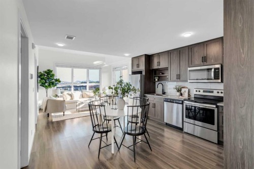 1402-350 Livingston Common Ne, Calgary, AB - Indoor Photo Showing Kitchen With Upgraded Kitchen