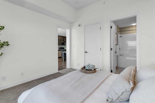 1402-350 Livingston Common Ne, Calgary, AB - Indoor Photo Showing Bedroom