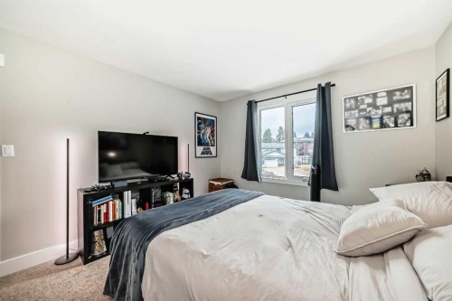 119 Pump Hill Bay Sw, Calgary, AB - Indoor Photo Showing Bedroom