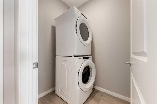 1411-250 Fireside View, Cochrane, AB - Indoor Photo Showing Laundry Room