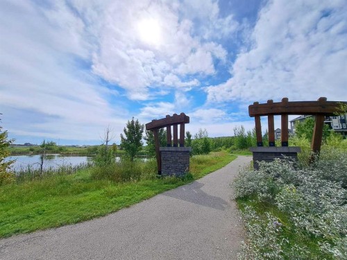 1411-250 Fireside View, Cochrane, AB - Outdoor With Body Of Water With View