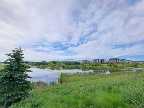 1411-250 Fireside View, Cochrane, AB - Outdoor With Body Of Water With View