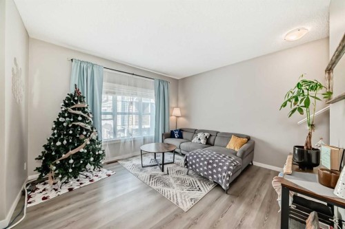 453-130 New Brighton Way Se, Calgary, AB - Indoor Photo Showing Living Room