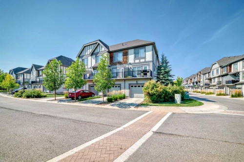 453-130 New Brighton Way Se, Calgary, AB - Outdoor With Balcony With Facade