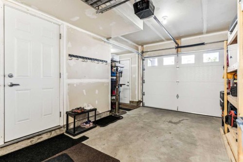 79 Redstone Circle Ne, Calgary, AB - Indoor Photo Showing Garage