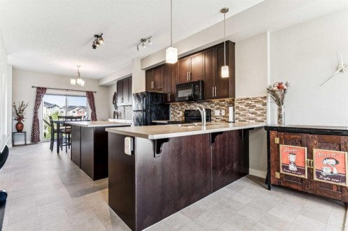 79 Redstone Circle Ne, Calgary, AB - Indoor Photo Showing Kitchen With Upgraded Kitchen