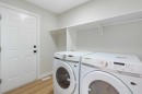 335 Hidden Creek Boulevard Nw, Calgary, AB  - Indoor Photo Showing Laundry Room 