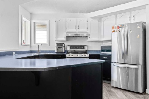 295 Coventry Road Ne, Calgary, AB - Indoor Photo Showing Kitchen