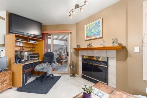 2219 Westmount Road Nw, Calgary, AB - Indoor Photo Showing Office With Fireplace