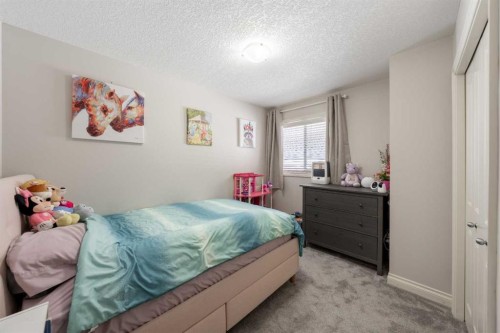 178 Prairie Springs Crescent Sw, Airdrie, AB - Indoor Photo Showing Bedroom