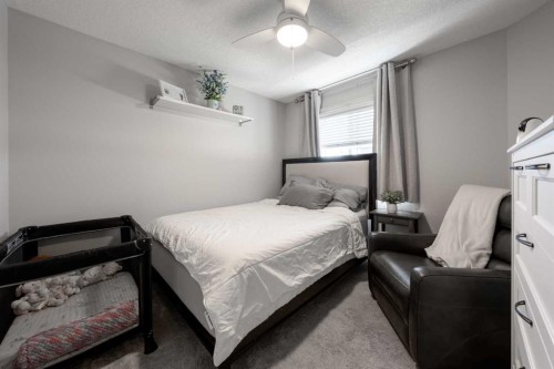 178 Prairie Springs Crescent Sw, Airdrie, AB - Indoor Photo Showing Bedroom