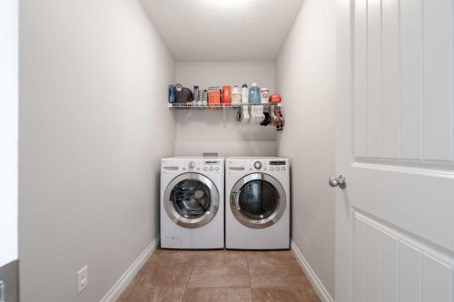 178 Prairie Springs Crescent Sw, Airdrie, AB - Indoor Photo Showing Laundry Room