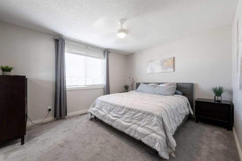 178 Prairie Springs Crescent Sw, Airdrie, AB - Indoor Photo Showing Bedroom