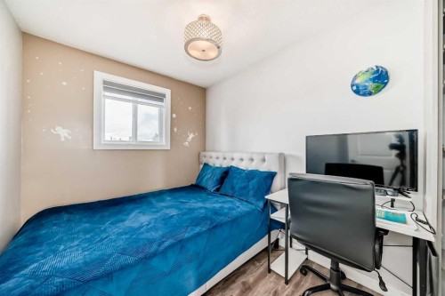 42 Taraglen Road Ne, Calgary, AB - Indoor Photo Showing Bedroom