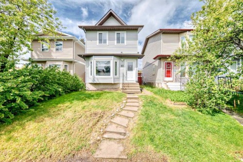 42 Taraglen Road Ne, Calgary, AB - Outdoor With Facade
