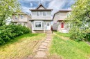 42 Taraglen Road Ne, Calgary, AB  - Outdoor With Facade 