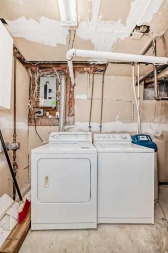 42 Taraglen Road Ne, Calgary, AB - Indoor Photo Showing Laundry Room
