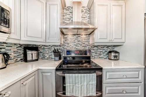 42 Taraglen Road Ne, Calgary, AB - Indoor Photo Showing Kitchen