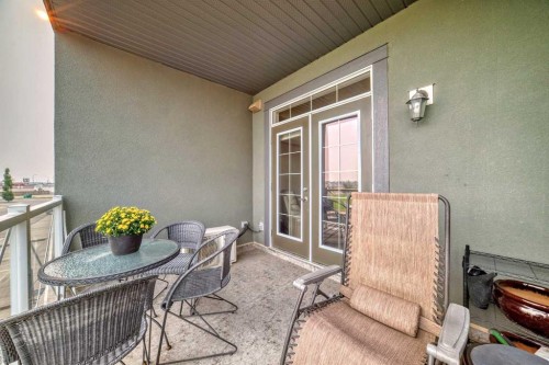211-1005A Westmount Drive, Strathmore, AB - Outdoor With Deck Patio Veranda With Exterior