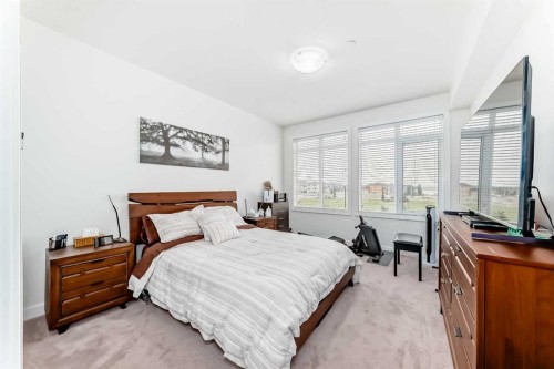 211-1005A Westmount Drive, Strathmore, AB - Indoor Photo Showing Bedroom