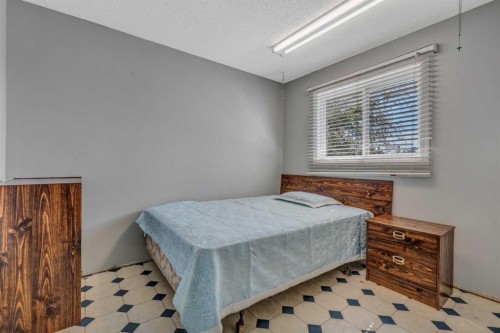 8 Pinelore Place Ne, Calgary, AB - Indoor Photo Showing Bedroom