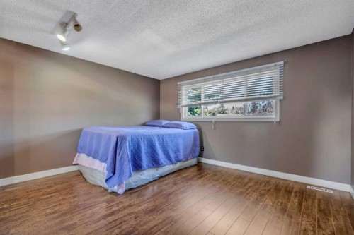 8 Pinelore Place Ne, Calgary, AB - Indoor Photo Showing Bedroom