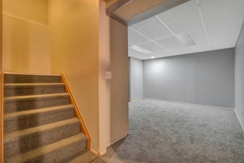 8 Pinelore Place Ne, Calgary, AB - Indoor Photo Showing Other Room