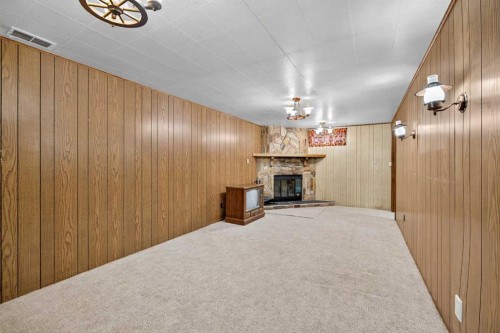 3012 30 Avenue Se, Calgary, AB - Indoor Photo Showing Other Room With Fireplace