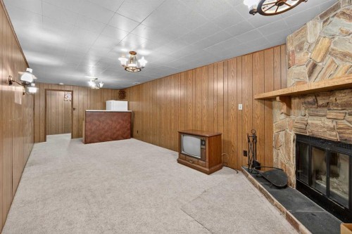 3012 30 Avenue Se, Calgary, AB - Indoor Photo Showing Other Room With Fireplace