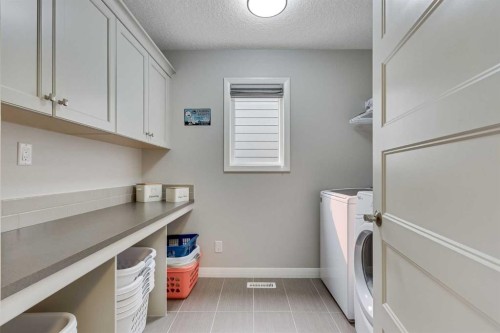 55 Sage Bluff Green Nw, Calgary, AB - Indoor Photo Showing Laundry Room