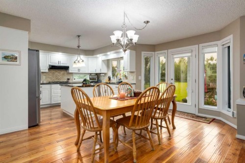 215 Alandale Place Sw, Rural Rocky View County, AB - Indoor Photo Showing Dining Room