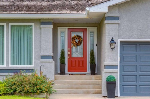 215 Alandale Place Sw, Rural Rocky View County, AB - Outdoor With Facade