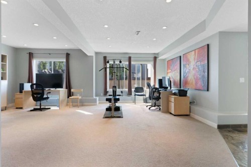 264 Windermere Drive, Chestermere, AB - Indoor Photo Showing Gym Room