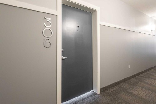 306-360 Harvest Hills Way Ne, Calgary, AB - Indoor Photo Showing Other Room
