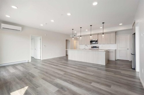 306-360 Harvest Hills Way Ne, Calgary, AB - Indoor Photo Showing Kitchen